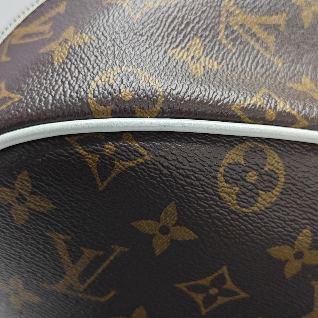 Monogram Coated Canvas Backpack Brown