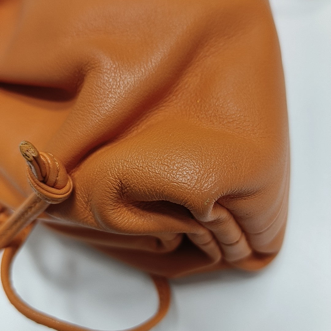 Authenticated pre-owned  The Pouch Mini Calfskin Orange - Crossbody Bag at Looply