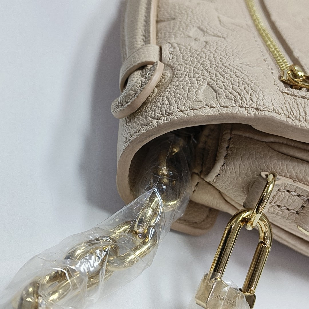 MÉTIS EAST WEST Monogram Calfskin Beige