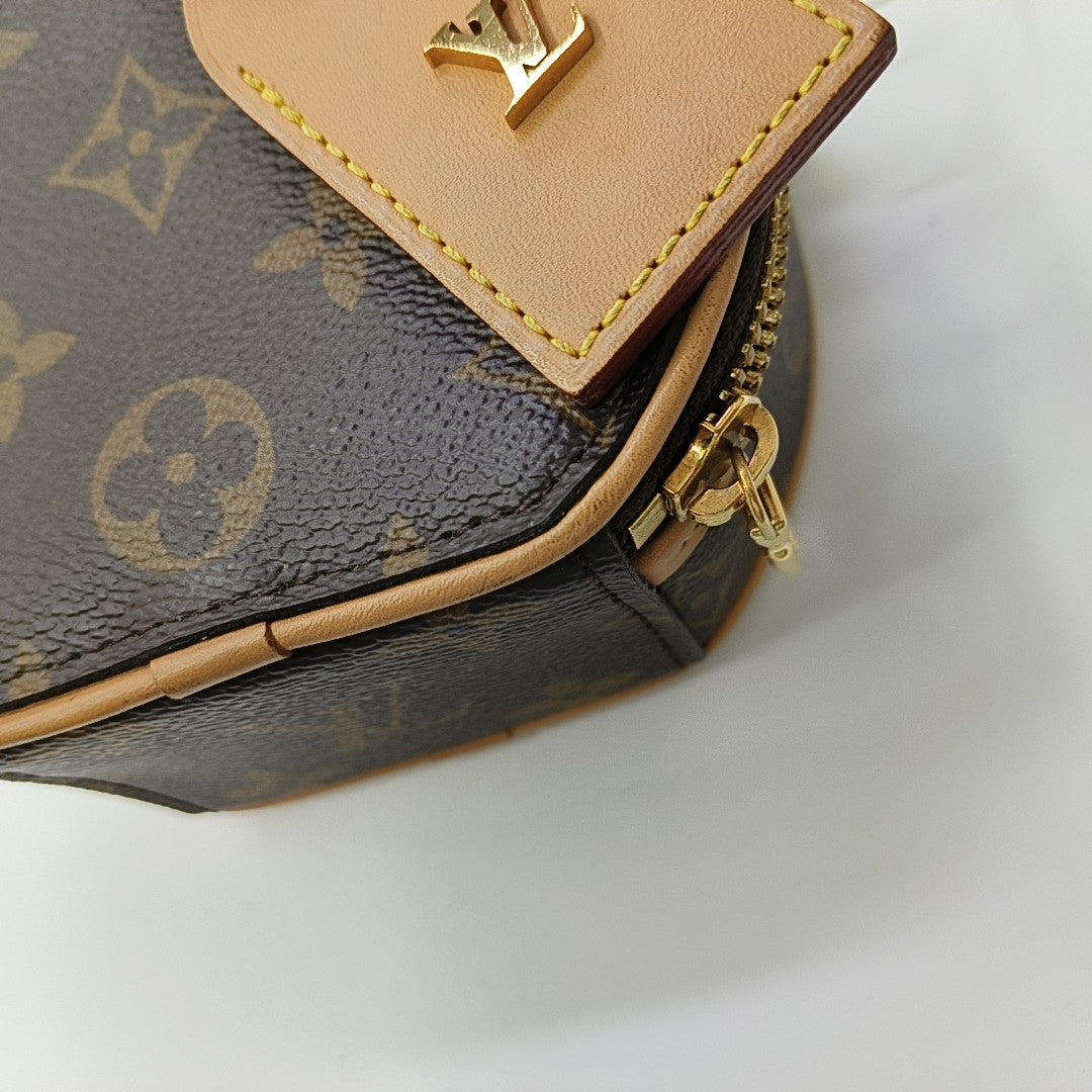 BOITE CHAPEAU Mini Monogram Coated Canvas Brown