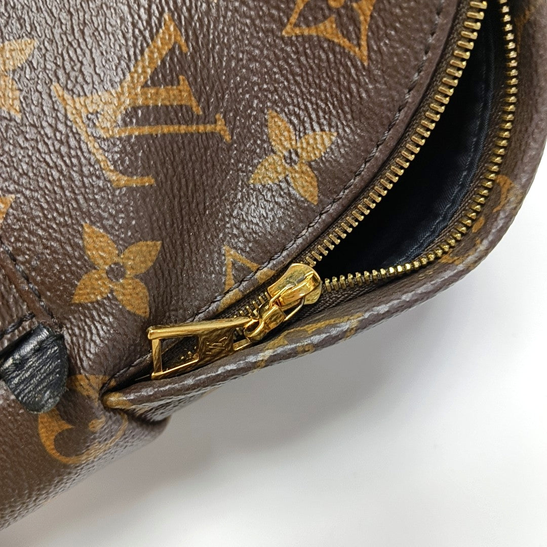 Authenticated pre-owned  PALM SPRINGS Mini Monogram Coated Canvas Brown - Backpack at Looply