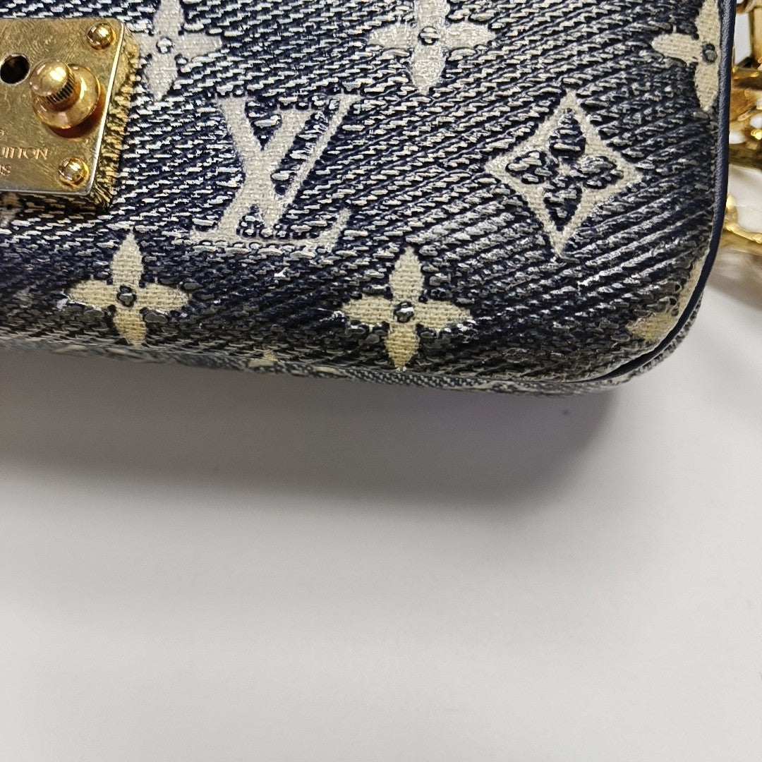 MÉTIS EAST WEST PM Monogram Coated Canvas Blue