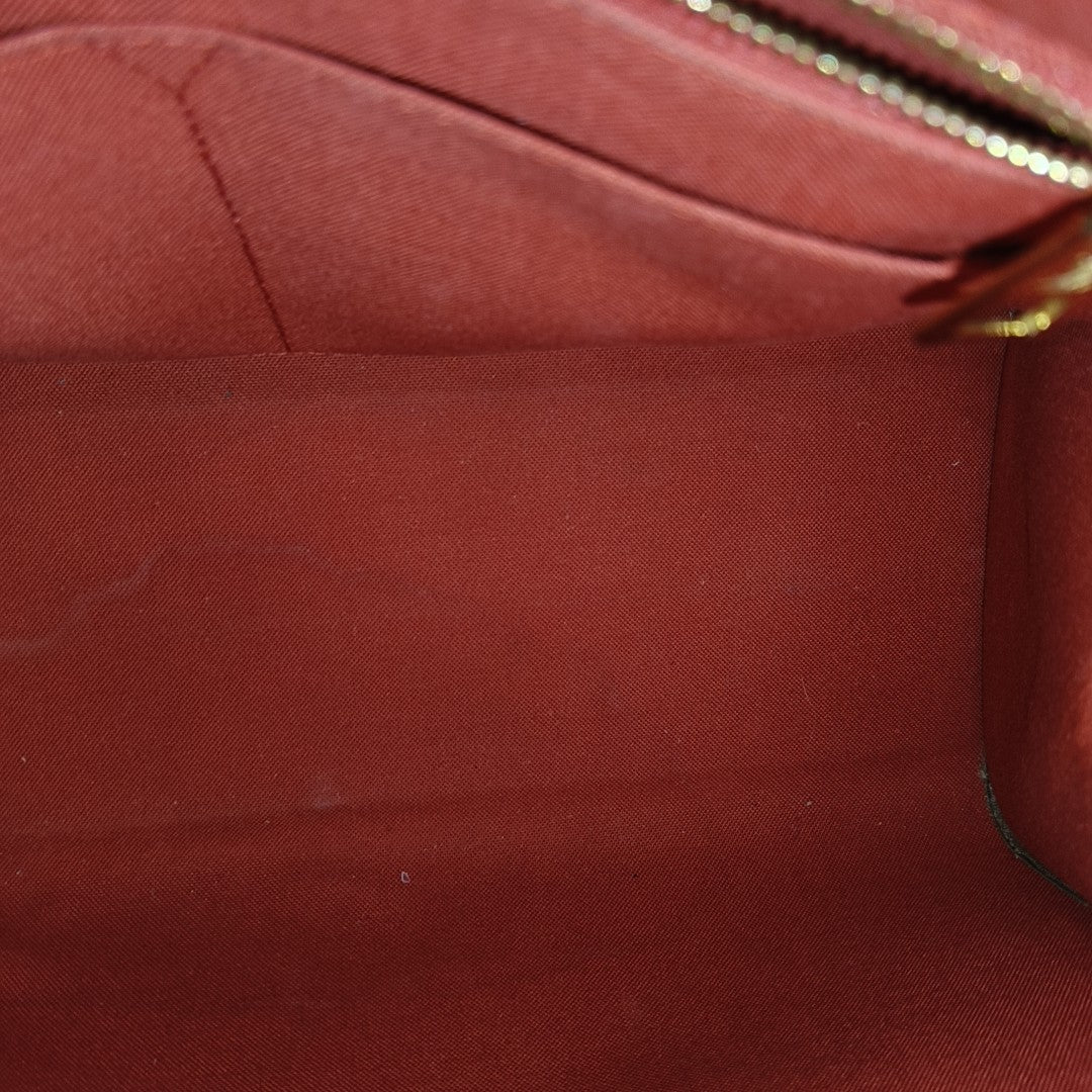 ONTHEGO MM Monogram Coated Canvas Brown