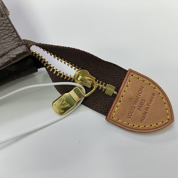 TOILET POCKET 26 Monogram Coated Canvas Brown