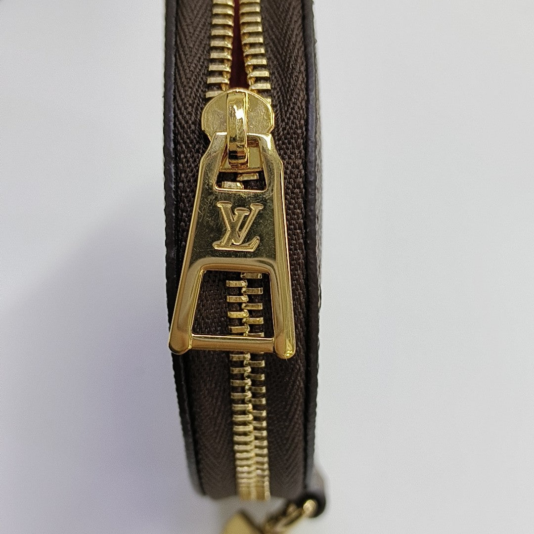ONTHEGO PM Monogram Coated Canvas Brown