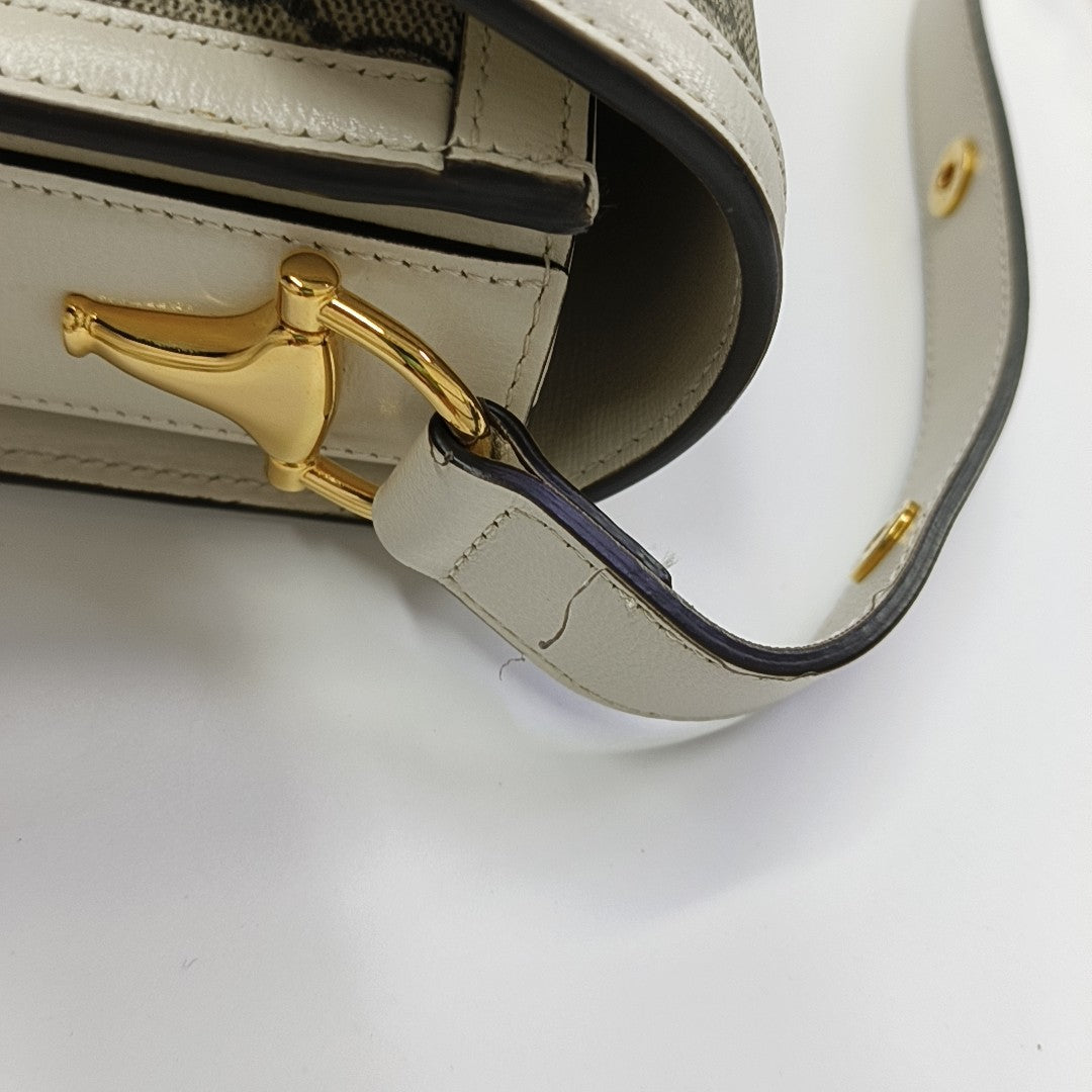 Horsebit 1955 Lona recubierta con monograma pequeño beige