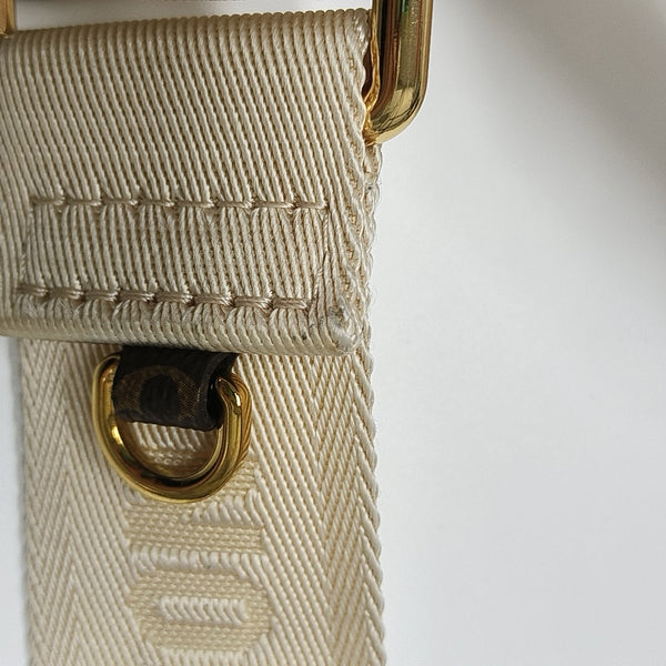 ONTHEGO PM Monogram Coated Canvas Brown