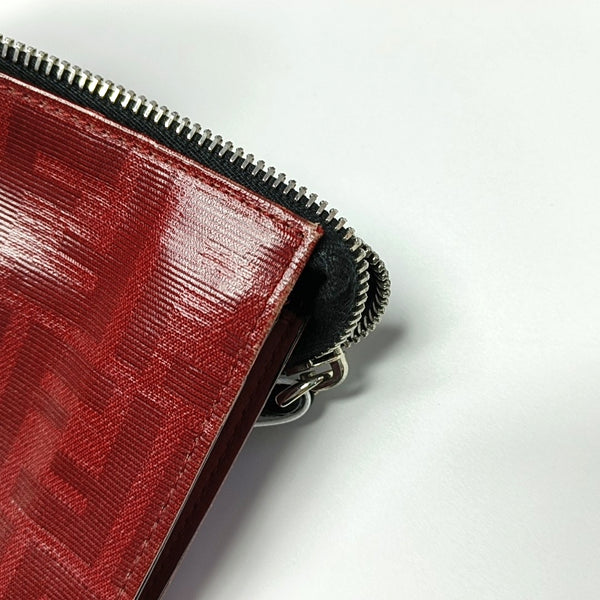 Authenticated pre-owned  Runaway Coated Canvas Red - Clutch at Looply