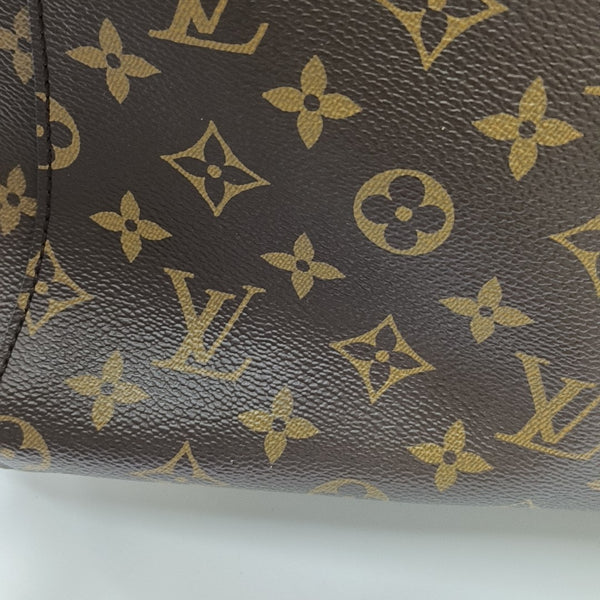 MONTAIGNE Monogram Coated Canvas Brown