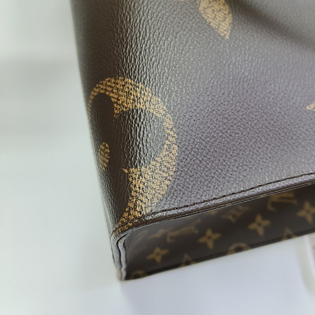 ONTHEGO MM Monogram Coated Canvas Brown