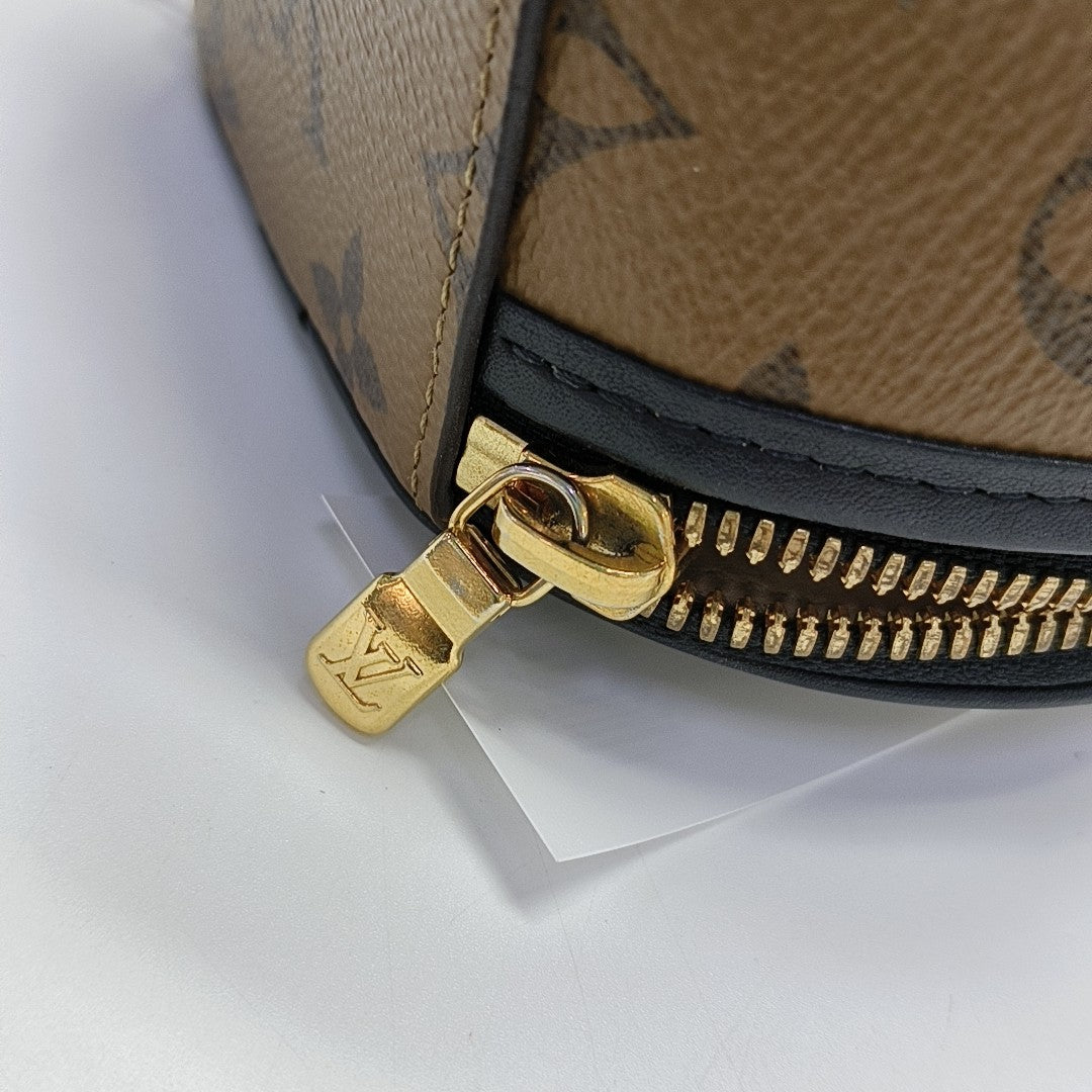 BOITE CHAPEAU Mini Monogram Coated Canvas Brown