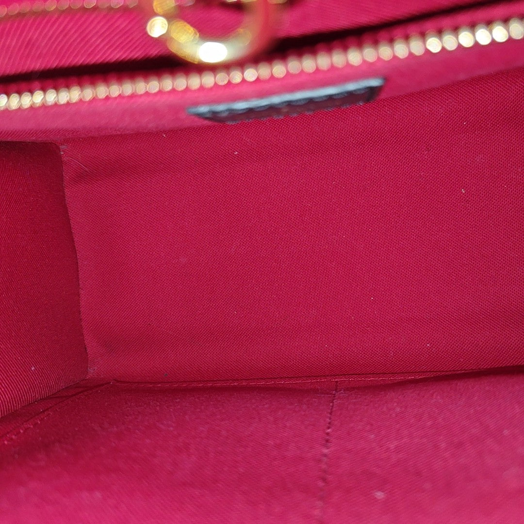 ONTHEGO PM Monogram Coated Canvas Brown