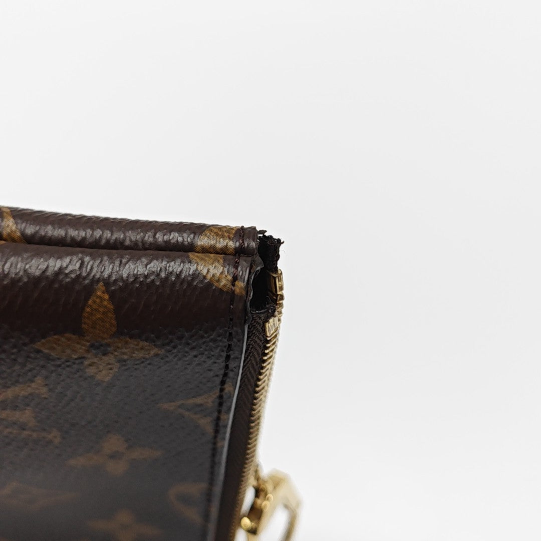 Monogram Coated Canvas Coin Purse Brown