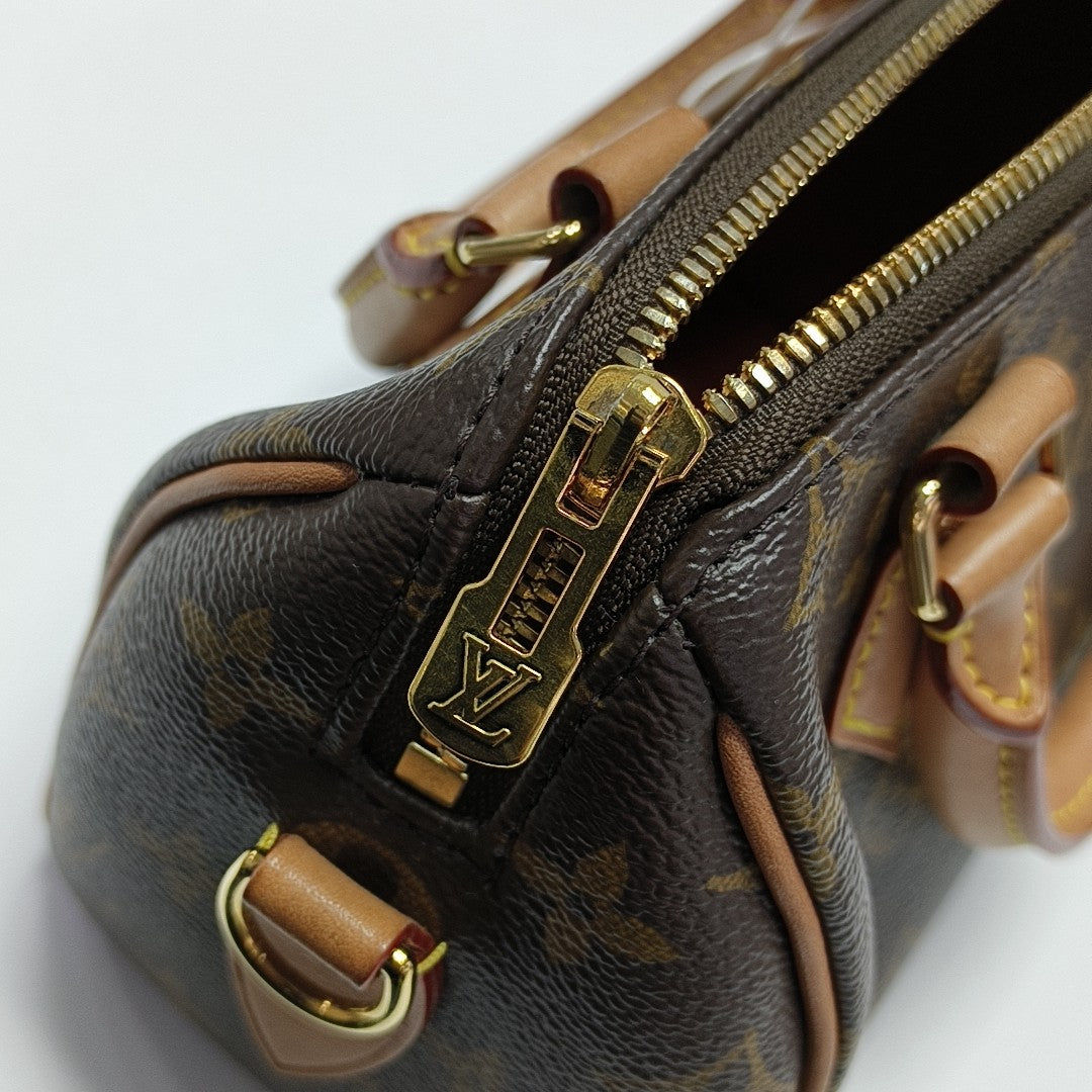 SPEEDY 20 Monogram Coated Canvas Brown