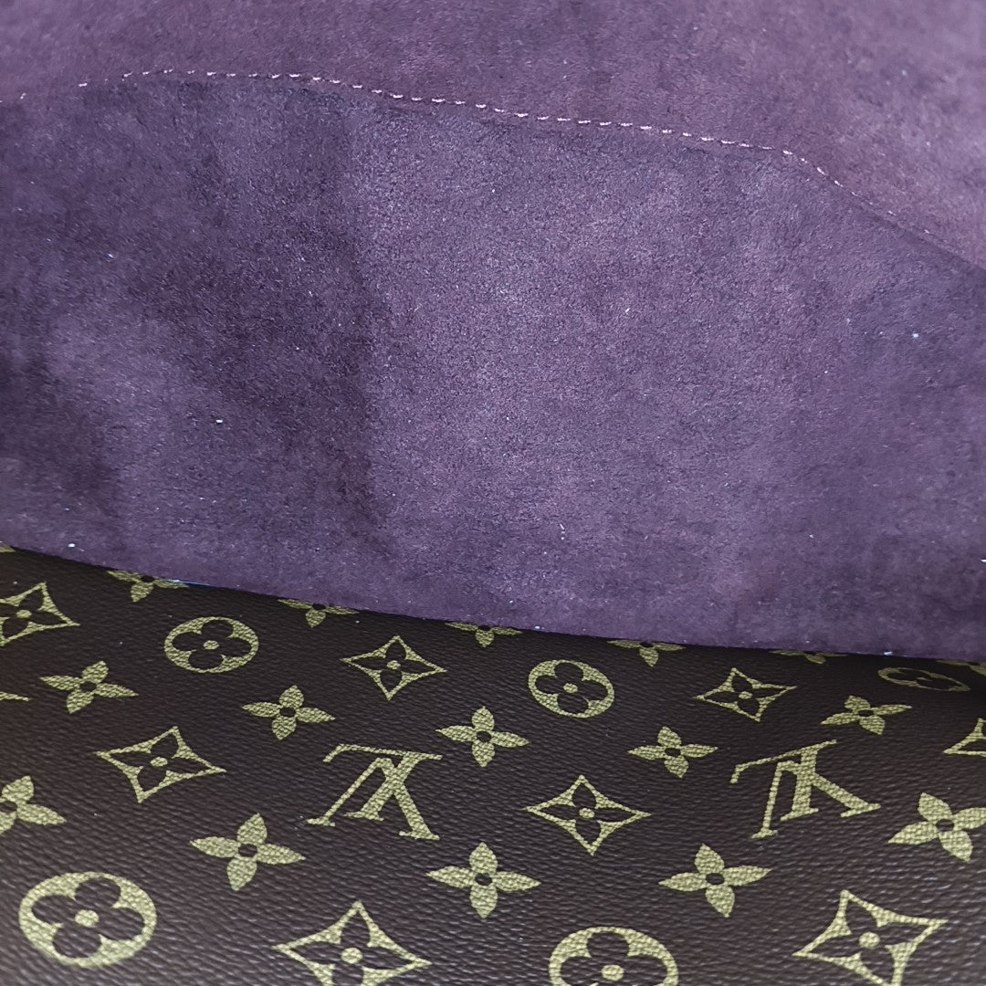 MONTAIGNE GM Monogram Coated Canvas Brown