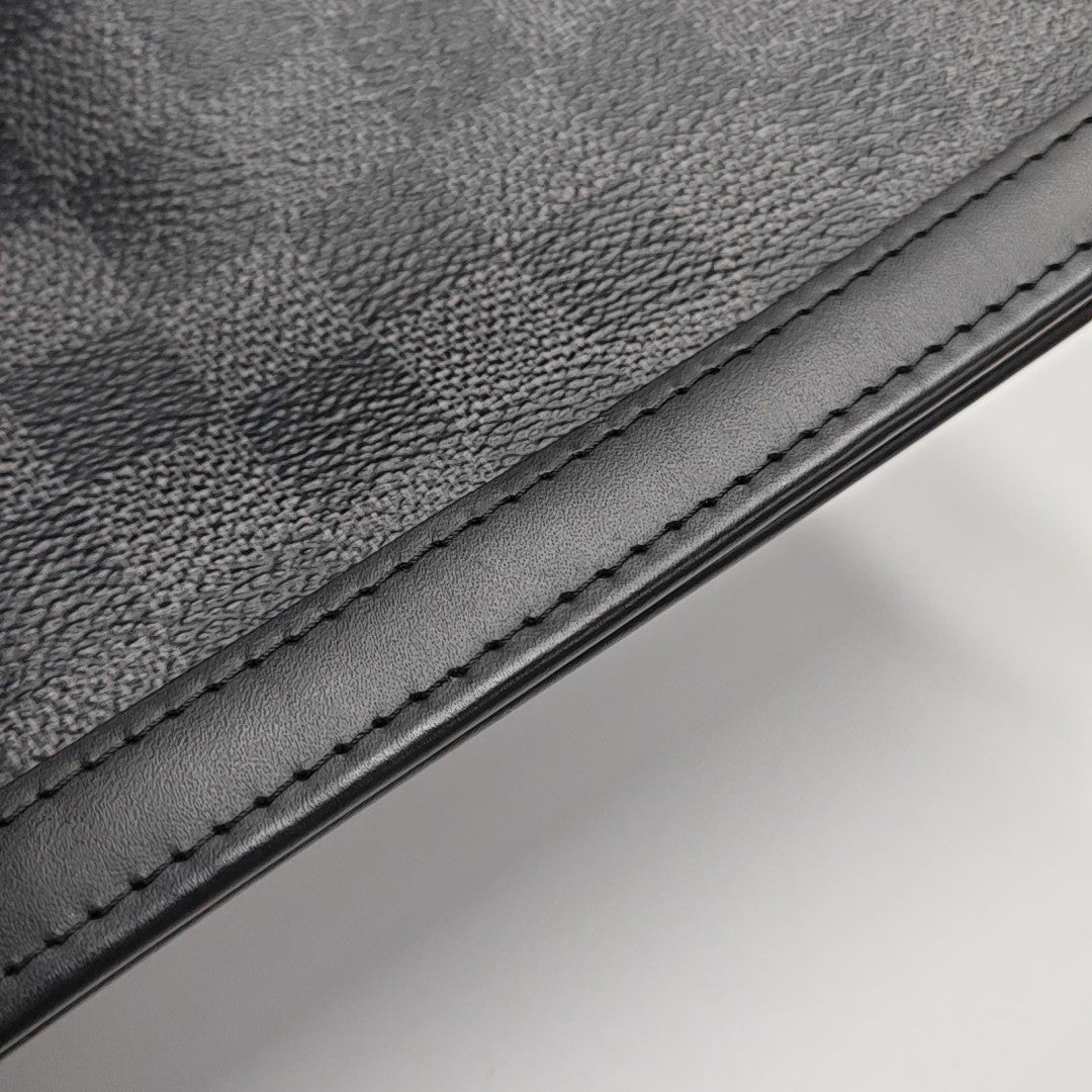 Pochette Voyag MM Damier Graphite Coated Canvas Gray