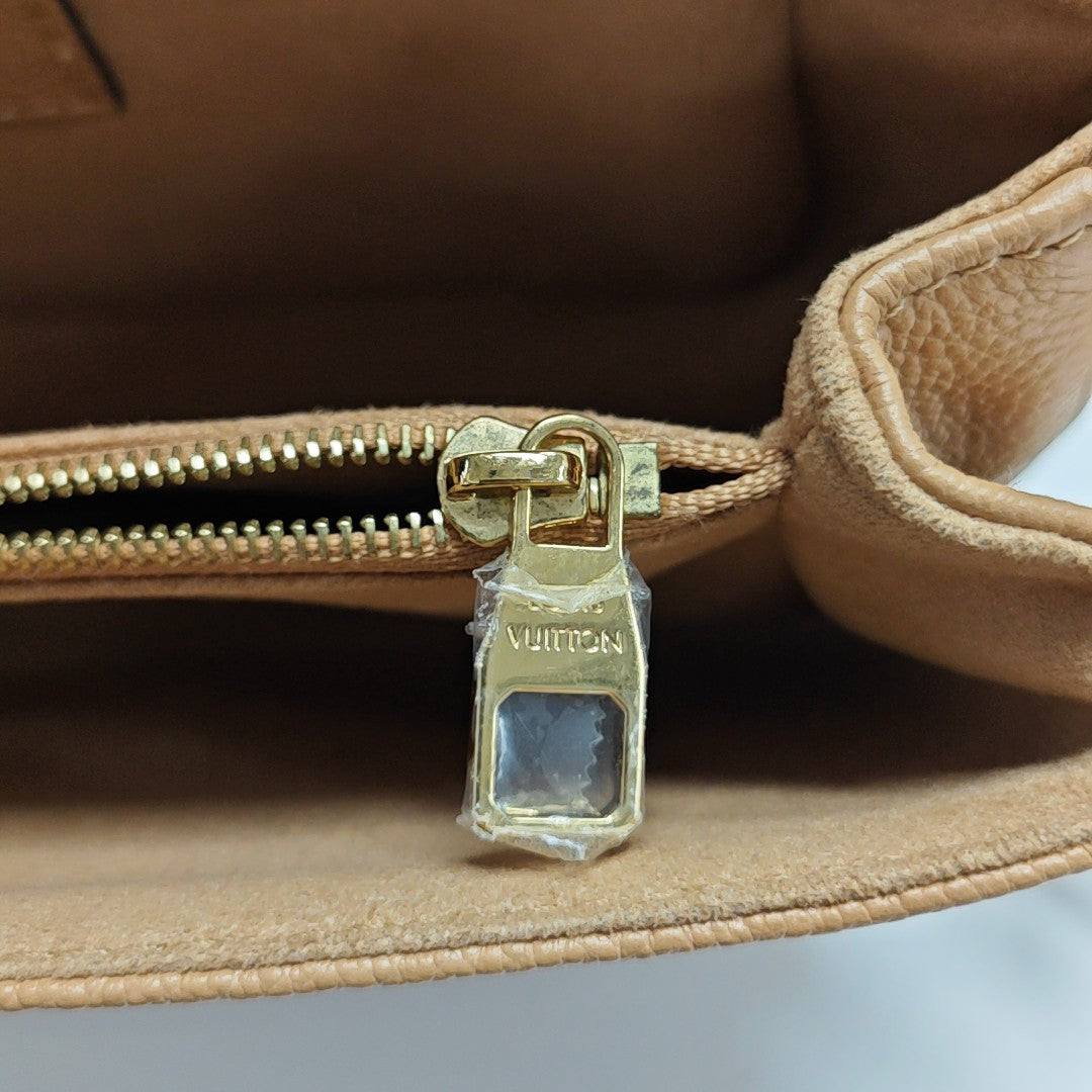 MÉTIS EAST WEST Monogram Calfskin Brown