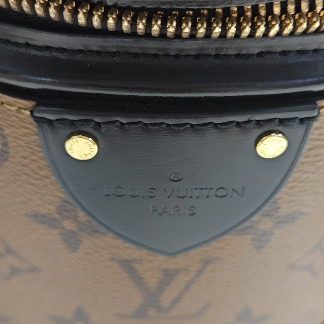 CANNES PM Monogram Coated Canvas Brown