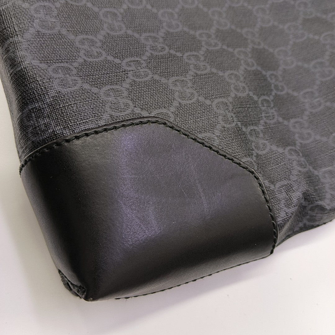 Rania Monogram Coated Canvas Black