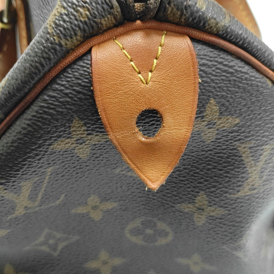 SPEEDY 25 Monogram Coated Canvas Brown