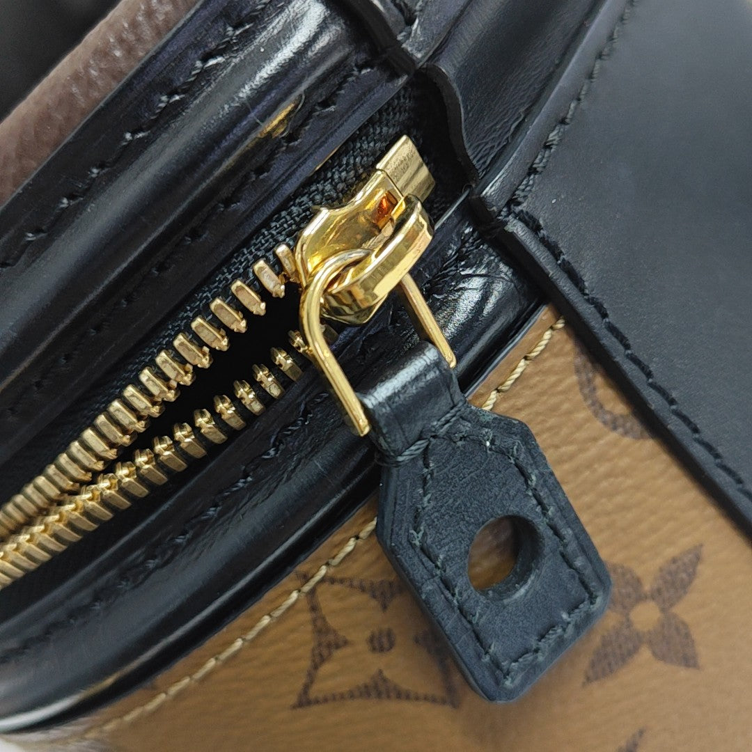 CANNES PM Monogram Coated Canvas Brown