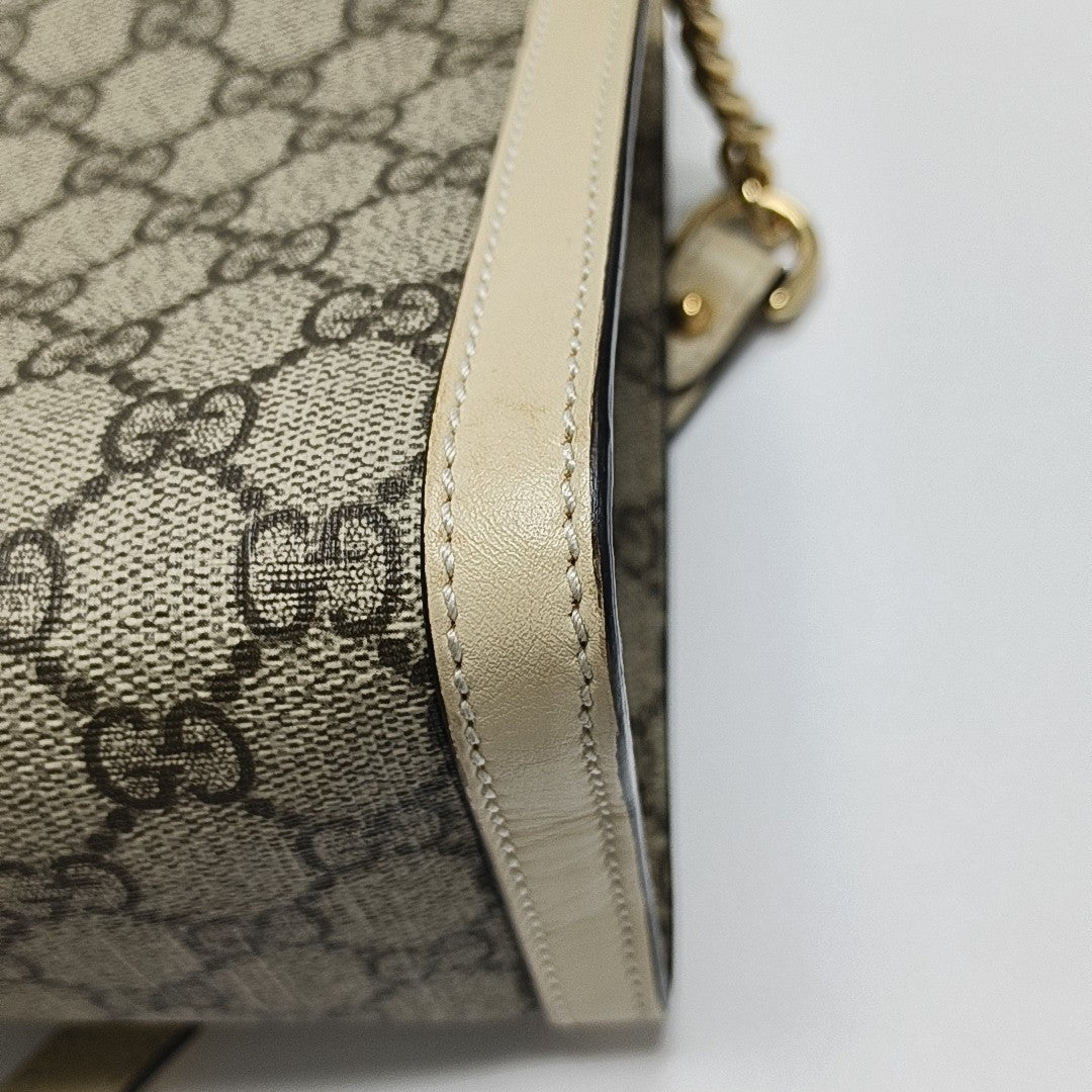 Padlock Small Monogram Coated Canvas Beige