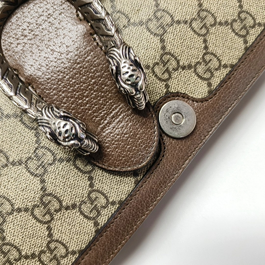 Authenticated pre-owned  Dionysus Monogram Coated Canvas Beige - Clutch at Looply