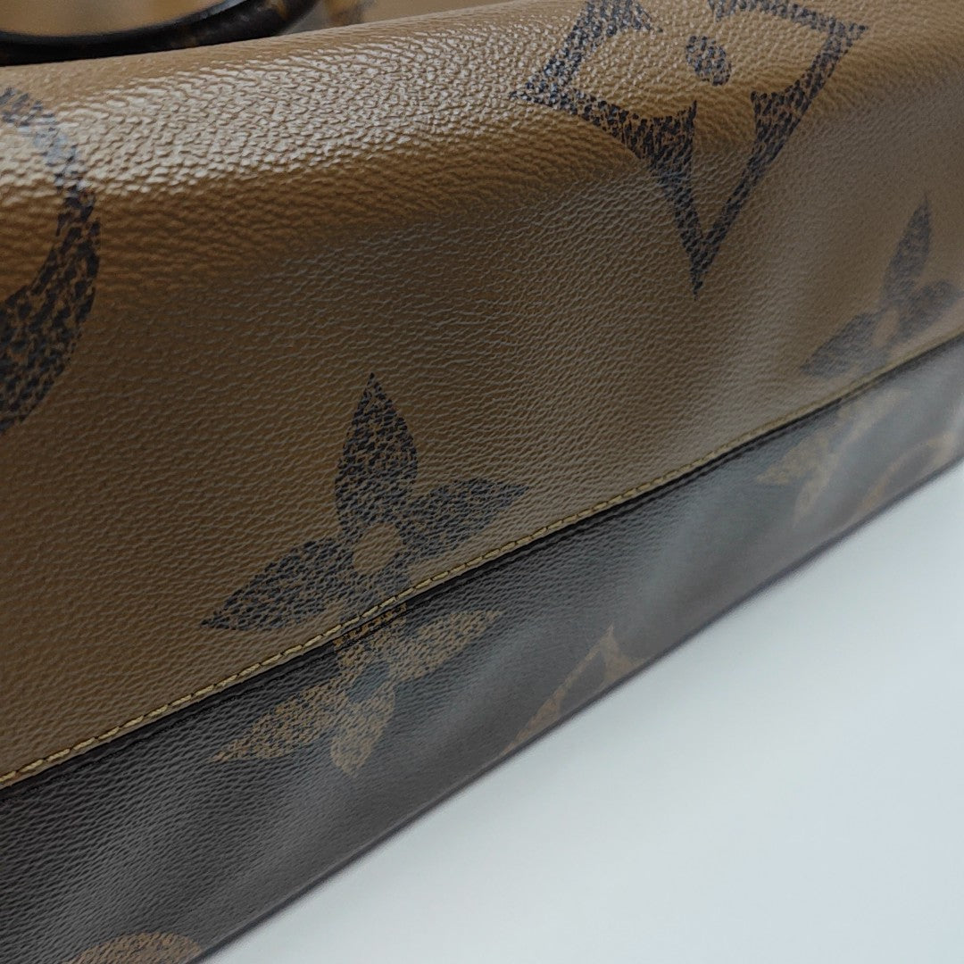 ONTHEGO GM Monogram Coated Canvas Brown