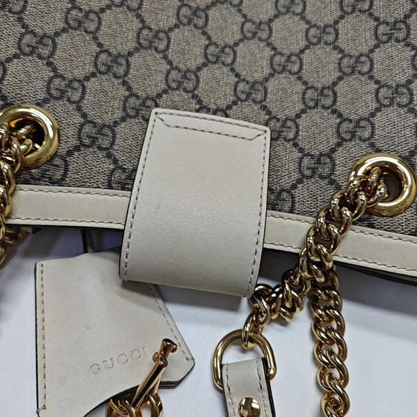 Padlock Small Monogram Coated Canvas Beige