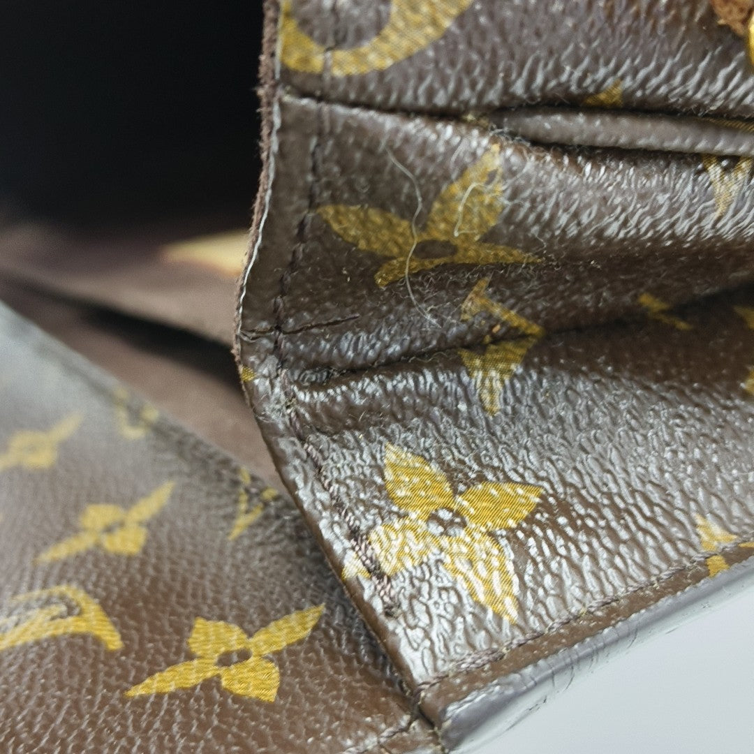 MÉTIS MM Monogram Coated Canvas Brown