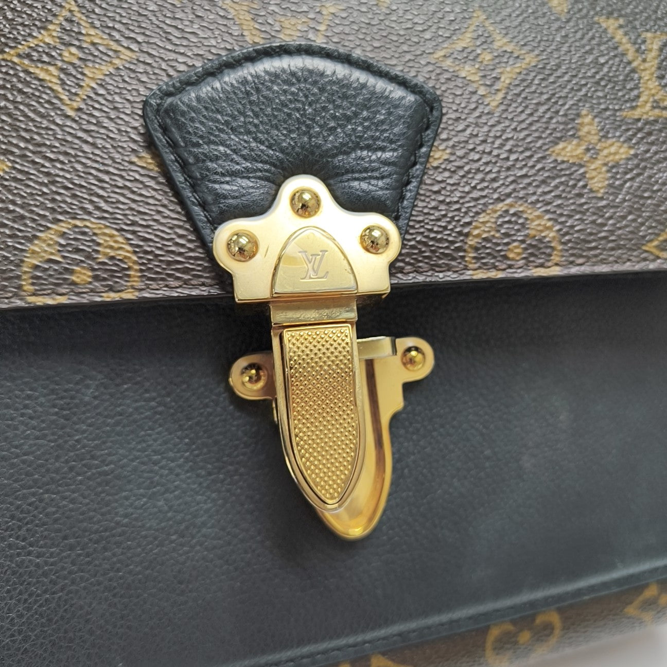 VICTOIRE Monogram Coated Canvas Brown