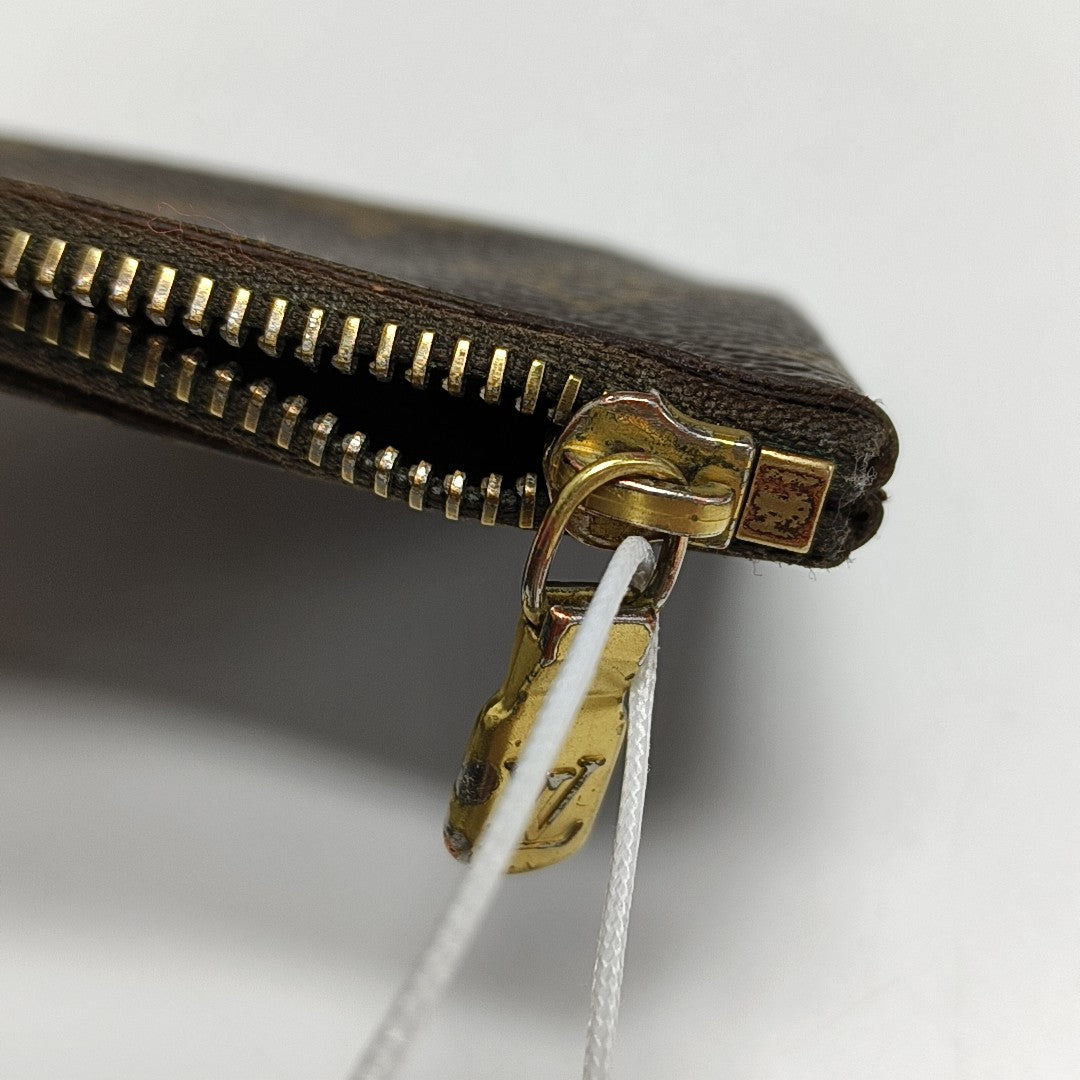 Monogram Coated Canvas Clutch Brown