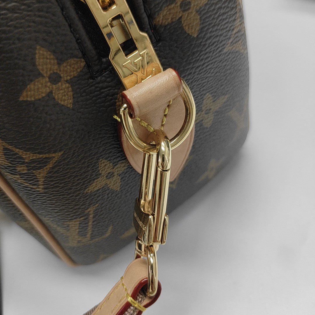 SPEEDY 20 Monogram Coated Canvas Brown