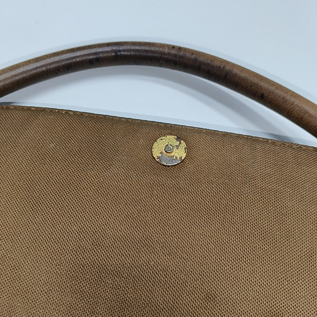LOOPING PM Monogram Coated Canvas Brown