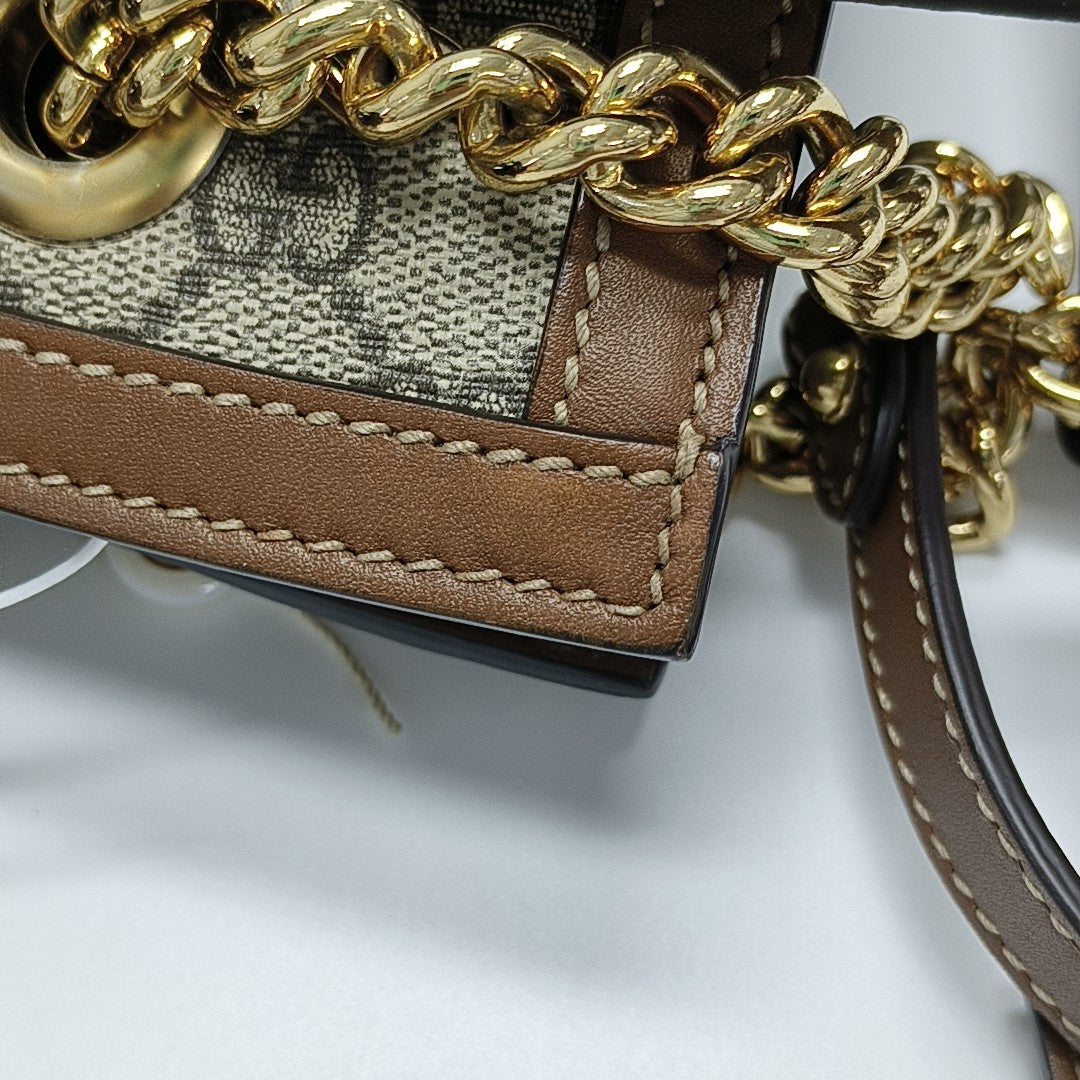 Padlock Small Monogram Coated Canvas Beige