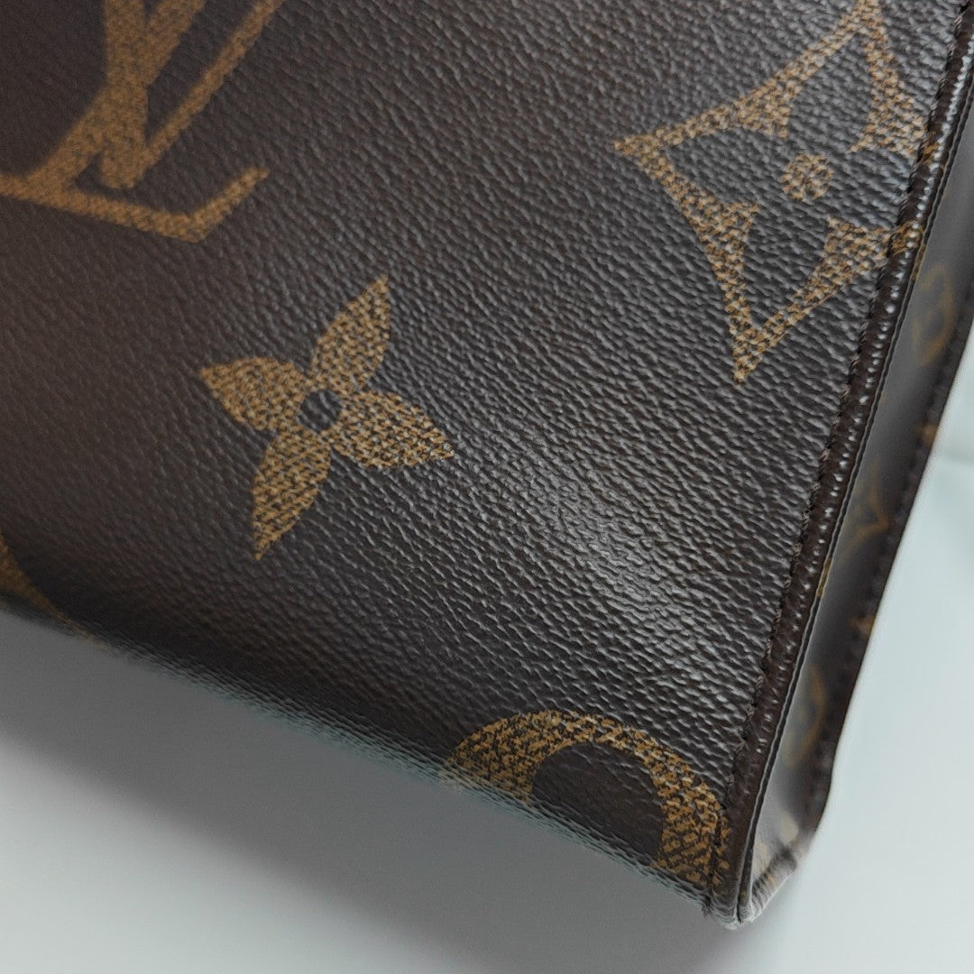 ONTHEGO PM Monogram Coated Canvas Brown