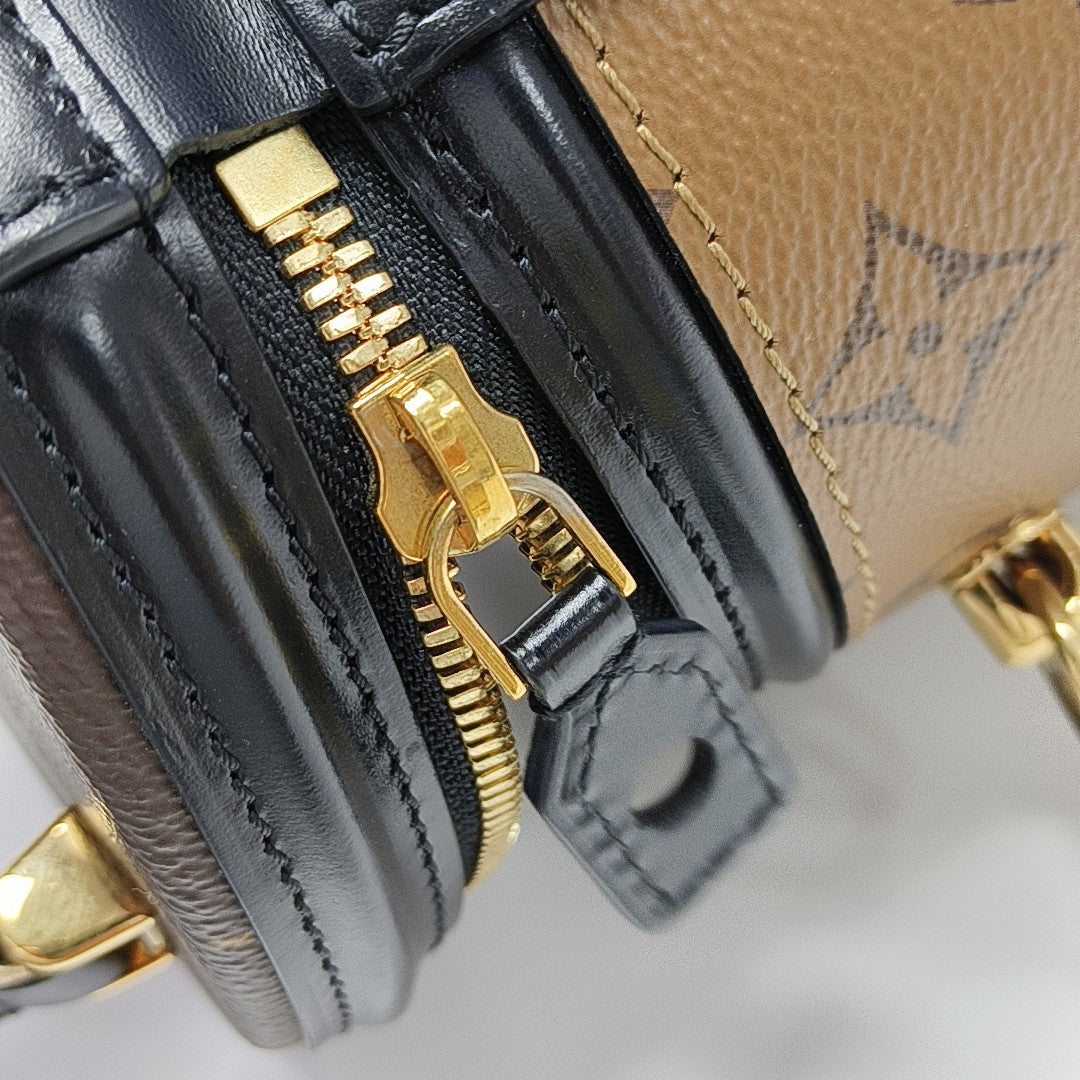 CANNES PM Monogram Coated Canvas Brown