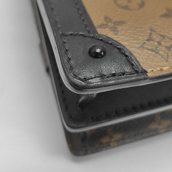 TRUNK Monogram Coated Canvas Brown