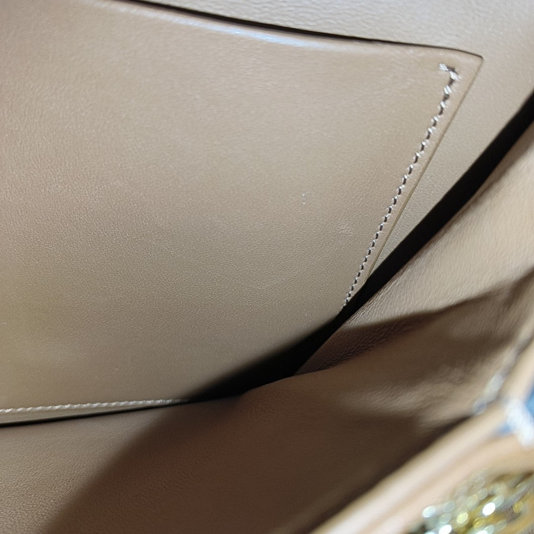 TRIOMPHE Medium Coated Canvas Brown