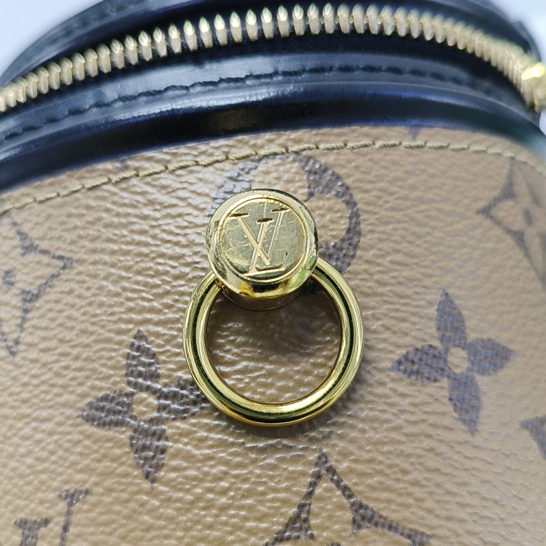 CANNES PM Monogram Coated Canvas Brown