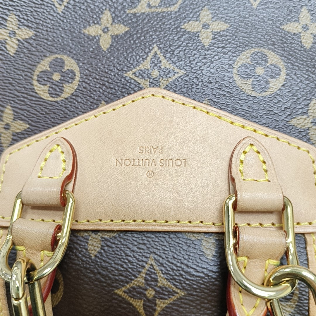 EXCURSION PM Monogram Coated Canvas Brown