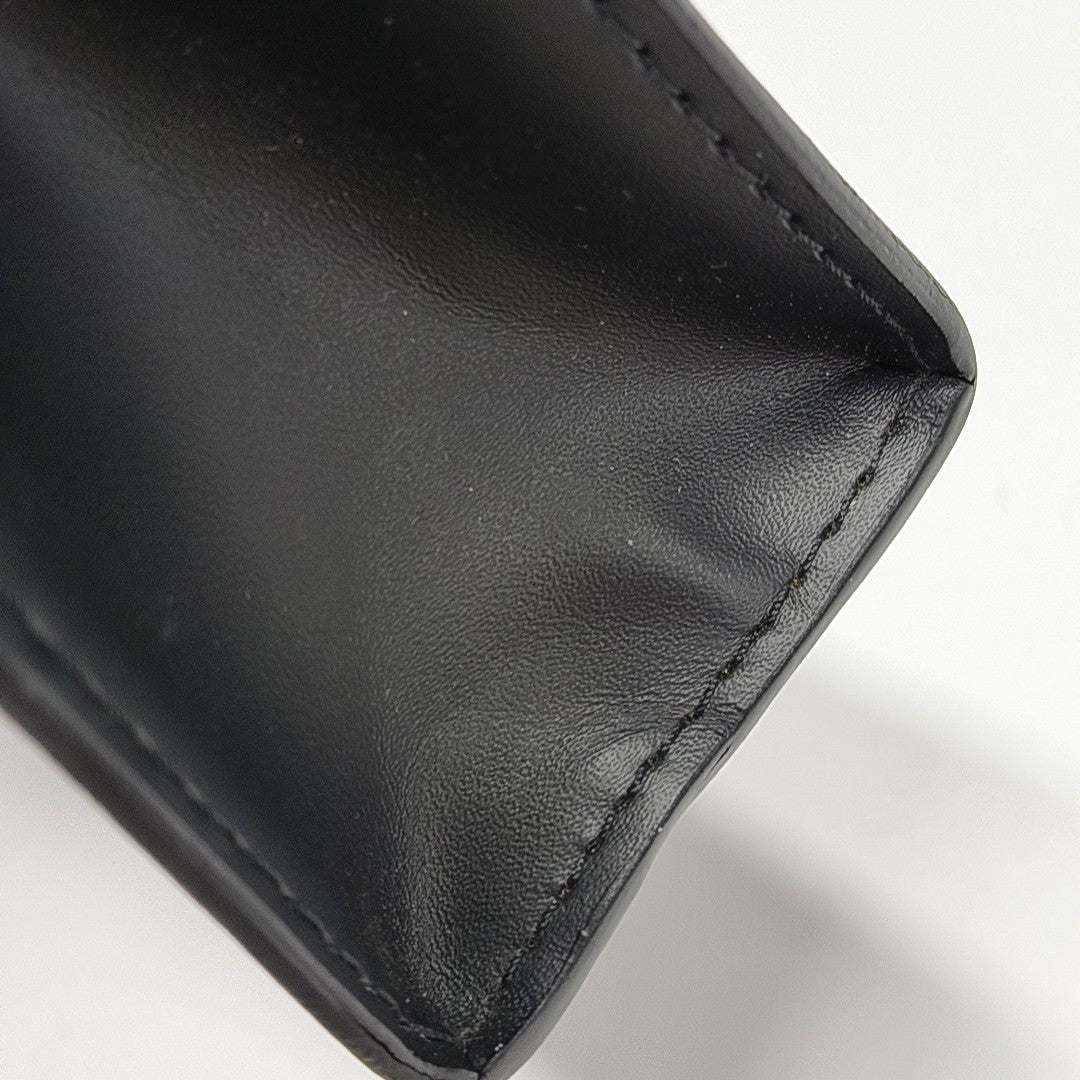 Pochette Voyag MM Monogram Coated Canvas Black