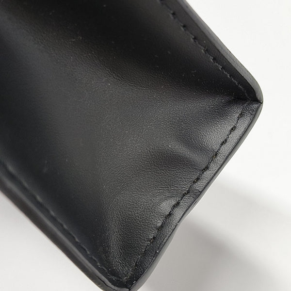 Pochette Voyag MM Monogram Coated Canvas Black