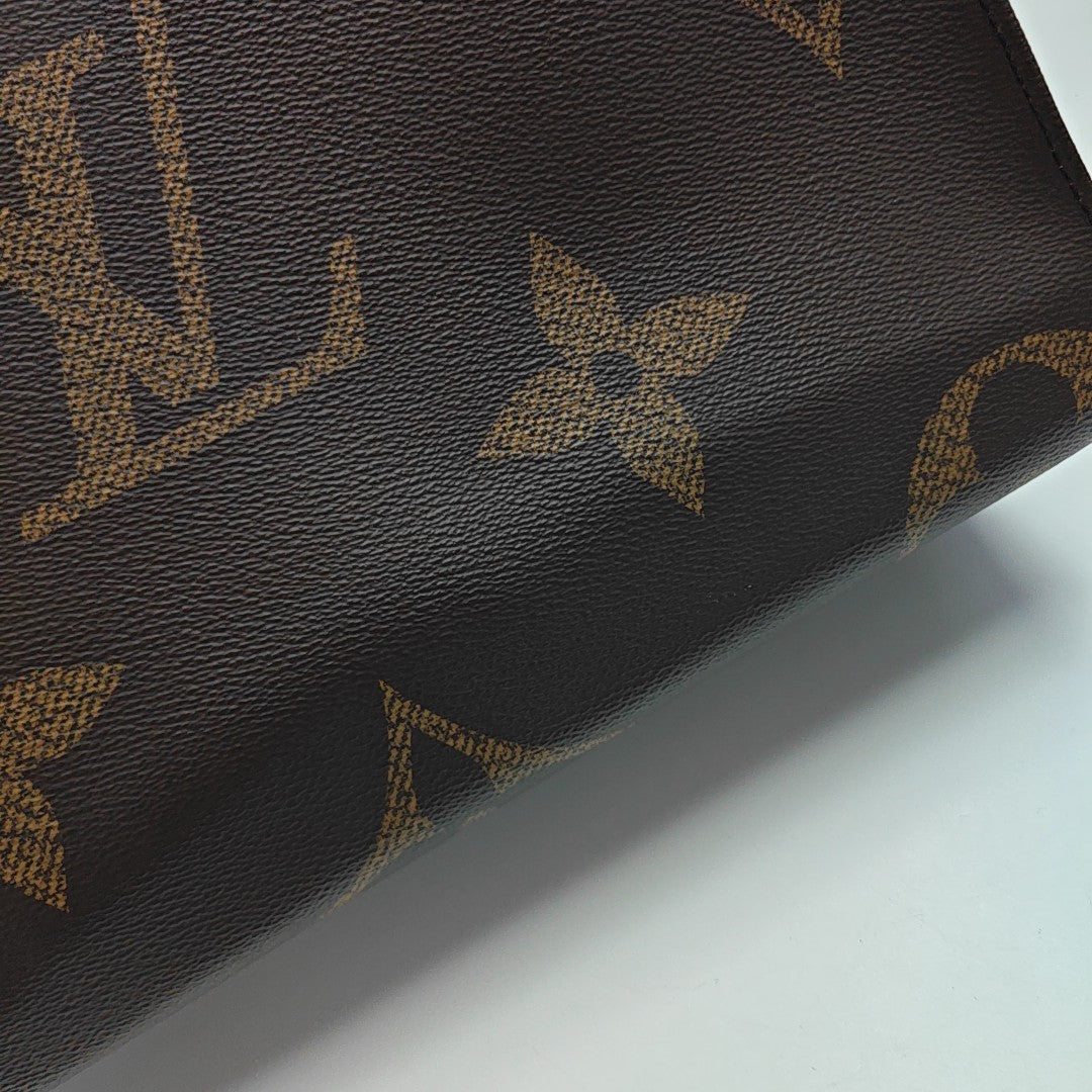 ONTHEGO MM Monogram Coated Canvas Brown