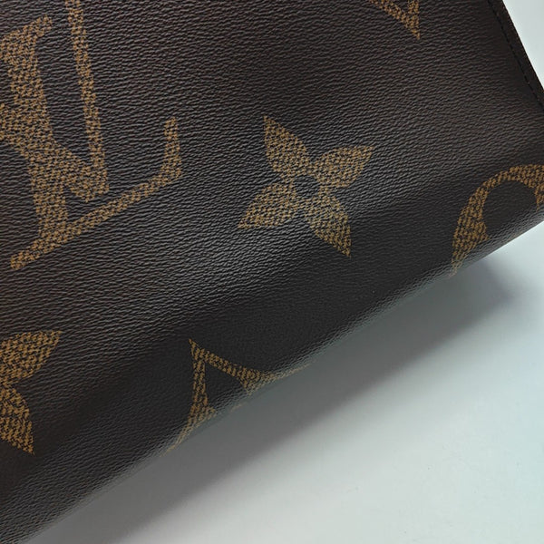 ONTHEGO MM Monogram Coated Canvas Brown