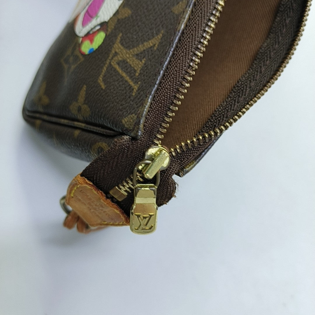 ACCESSOIRES GM Monogram Coated Canvas Brown