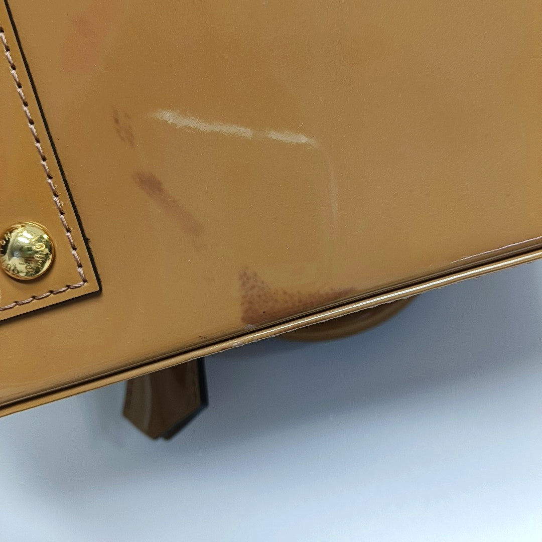 Authenticated pre-owned  ALMA Monogram Patent Leather Yellow - Shoulder Bag at Looply