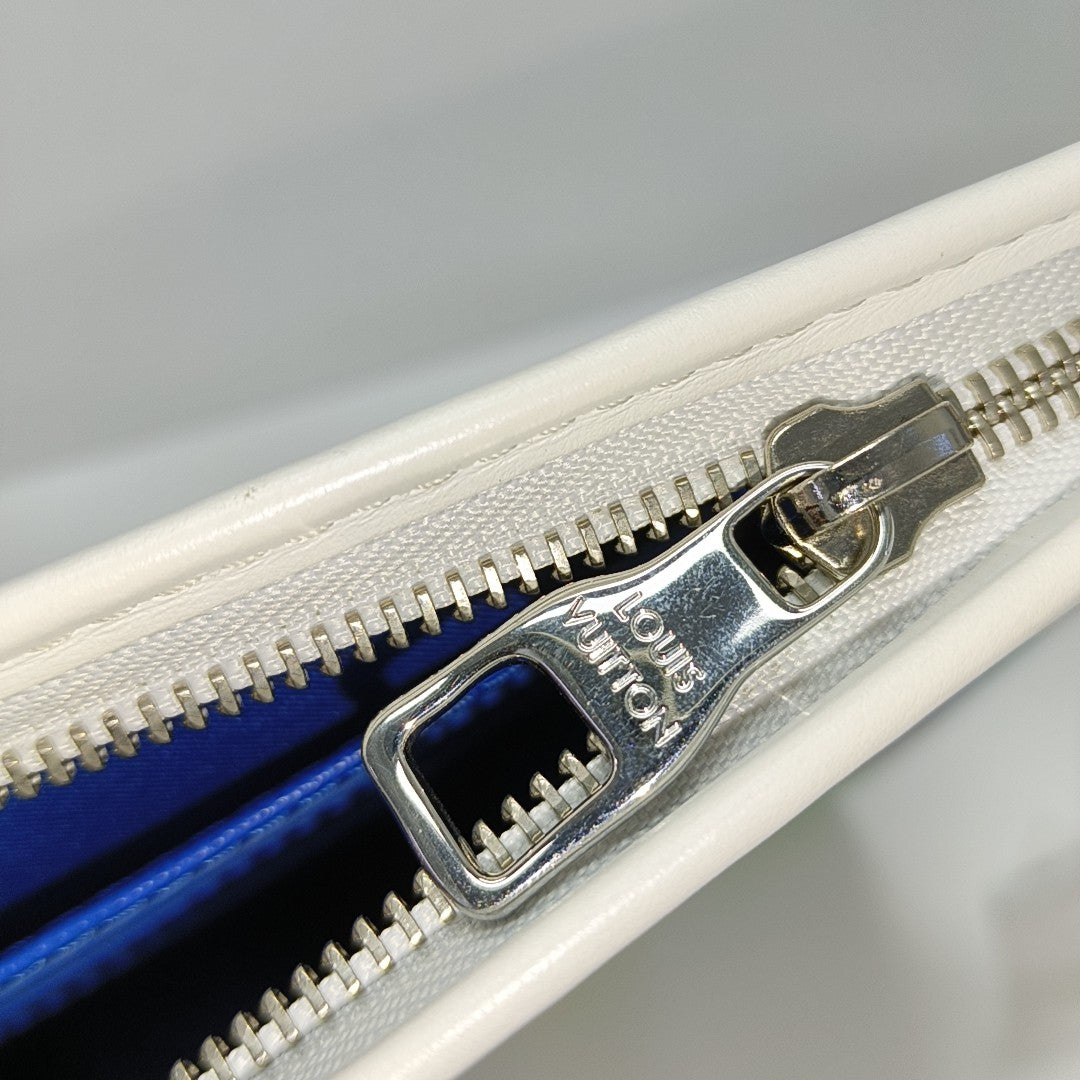 Pochette Voyag MM Monogram Coated Canvas White