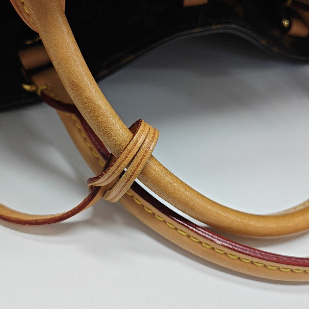 MONTAIGNE GM Monogram Coated Canvas Brown