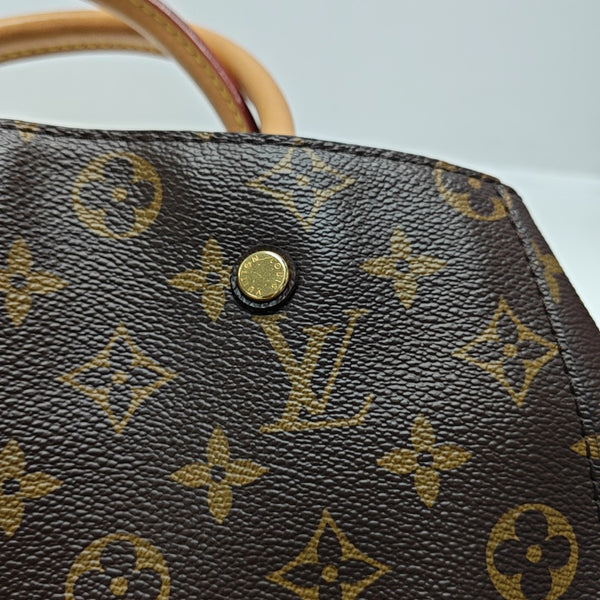 MONTAIGNE GM Monogram Coated Canvas Brown